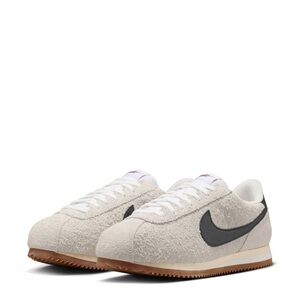 Nike women’s vintage Cream and Black Sneakers